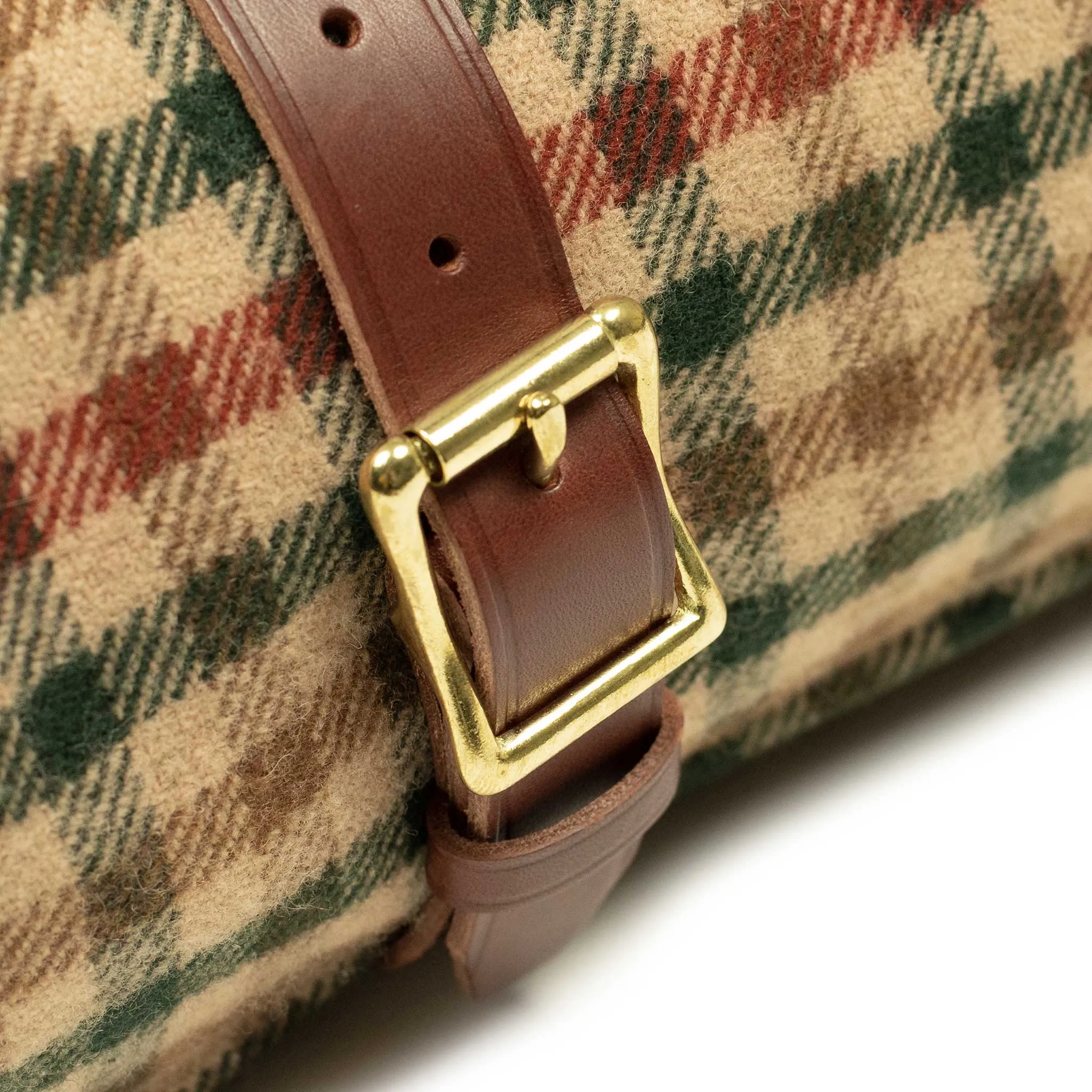 Waxed back picnic blanket in brown, red, and green gunclub lambswool tweed
