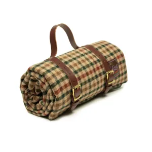 Waxed back picnic blanket in brown, red, and green gunclub lambswool tweed